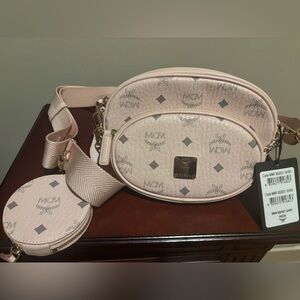 MCM powder pink essential multifunction bag, like new condition.